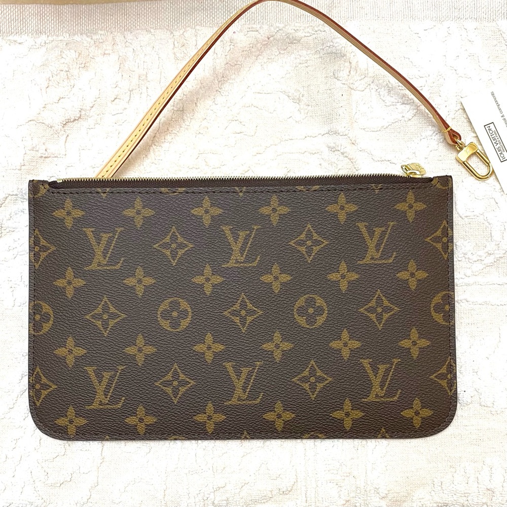 Louis Vuitton wristlet pouchette.